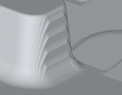 A closeup of a mesh model of the result of a MachineWorks GPU simulation of a large area mold, after aggressive simplification, showing individual cusps and surface quality